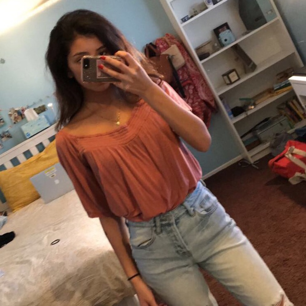 Soft and sexy pink off the shoulder top
